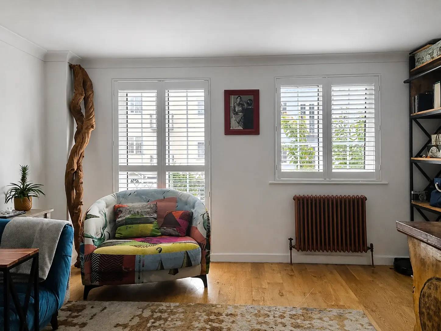 Full-height plantation shutters fitted in a Richmond living room.